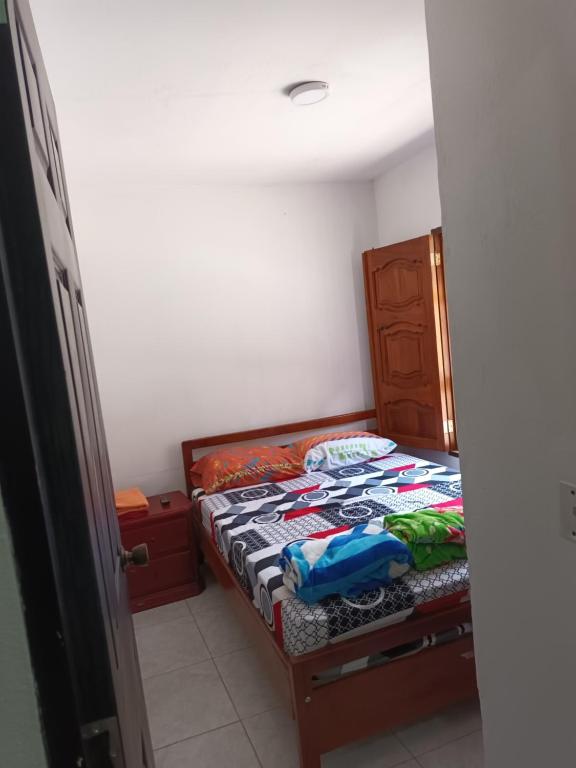 Postel nebo postele na pokoji v ubytování Hotel Internacional Jardín