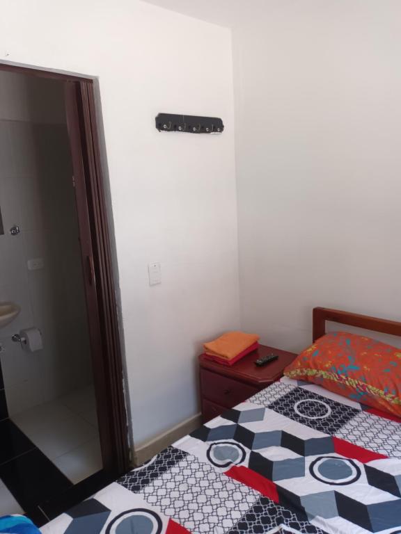 Postel nebo postele na pokoji v ubytování Hotel Internacional Jardín