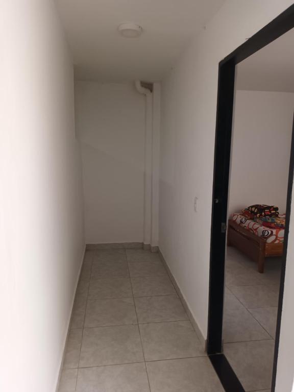 Postel nebo postele na pokoji v ubytování Hotel Internacional Jardín