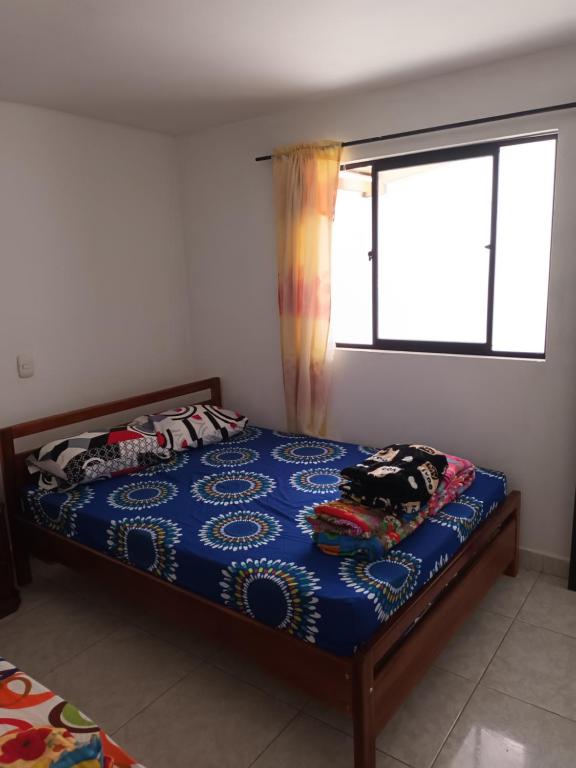Postel nebo postele na pokoji v ubytování Hotel Internacional Jardín