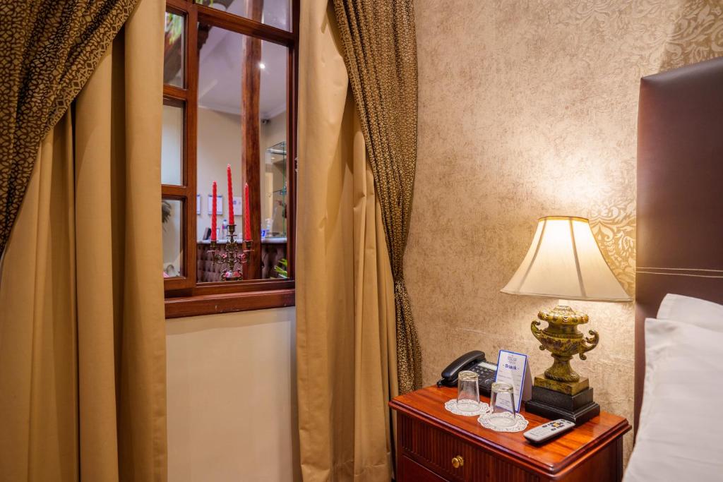 Postel nebo postele na pokoji v ubytování Santa Lucia House - Forum