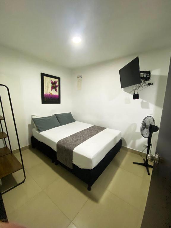 Postel nebo postele na pokoji v ubytování 33 Hotel Bulerias