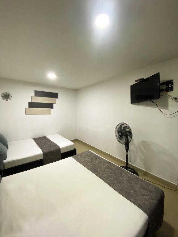 TV a/nebo společenská místnost v ubytování 33 Hotel Bulerias