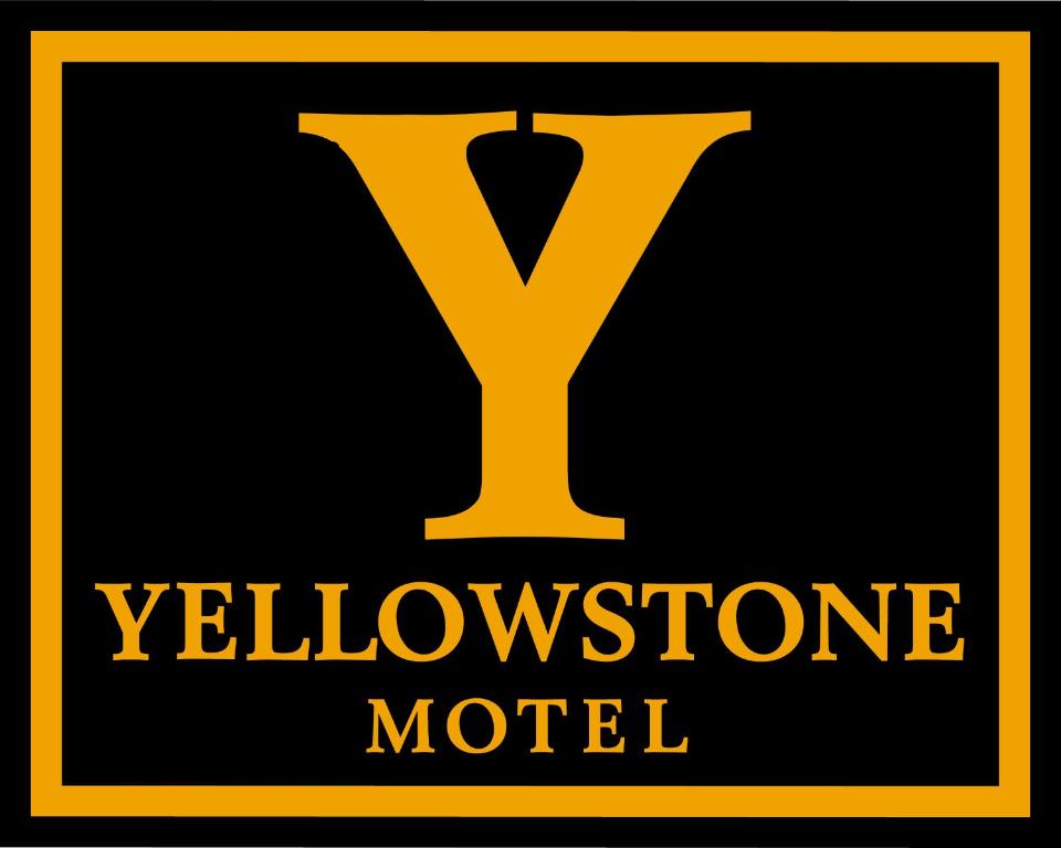 a yellow followerote motel logo on a black background at Yellowstone Motel in Ipswich