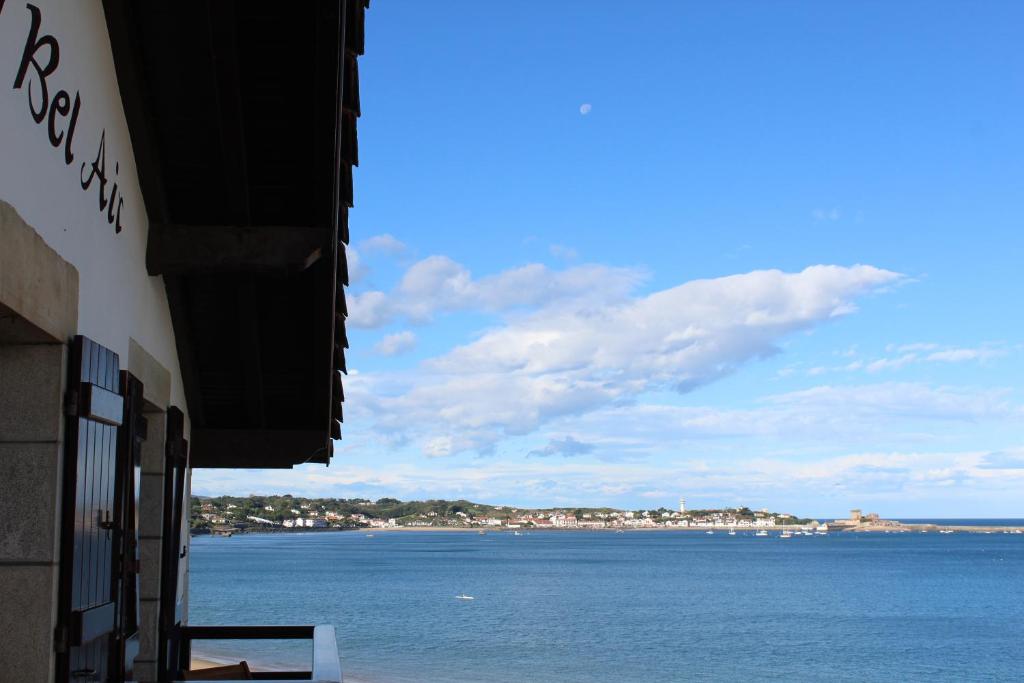 a view of the ocean from a building at Hotel Bel Air in Saint-Jean-de-Luz