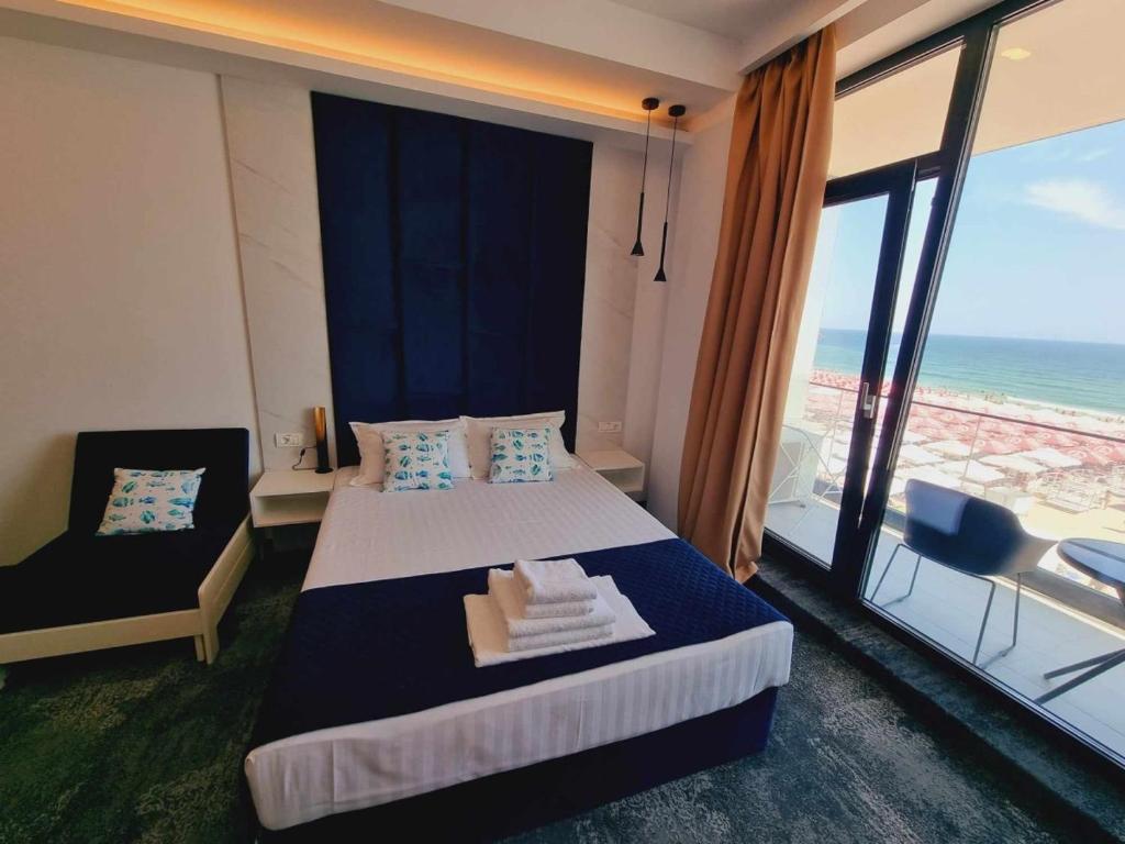 Кровать или кровати в номере Hotel Nava