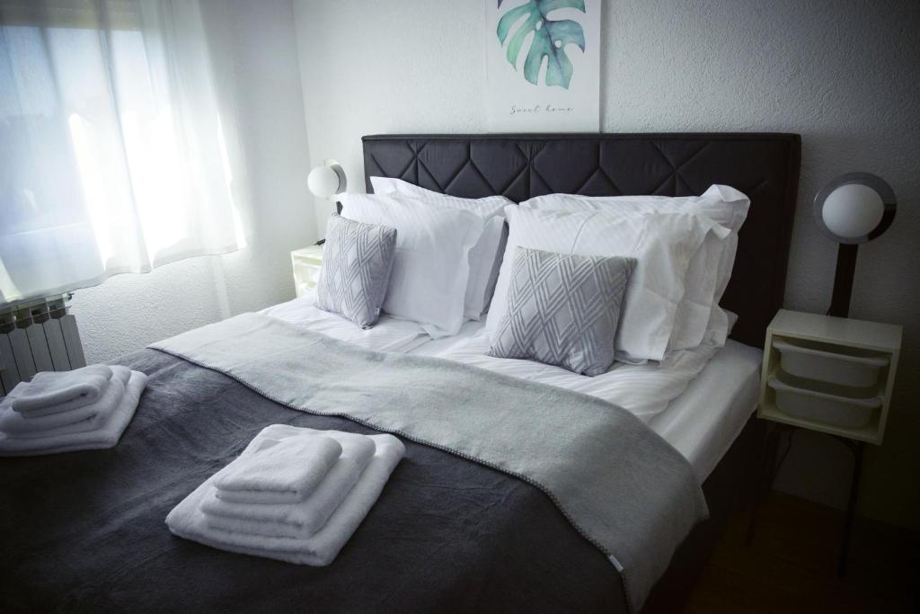Postel nebo postele na pokoji v ubytování Apartman JANA