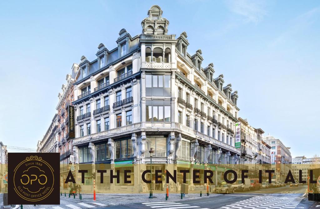 a building with a sign that reads at the center of africa at OPO Hotel in Brussels