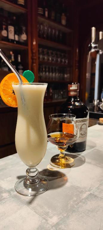Nápoje v ubytování Hôtel Spa & Restaurant Ô Pervenches