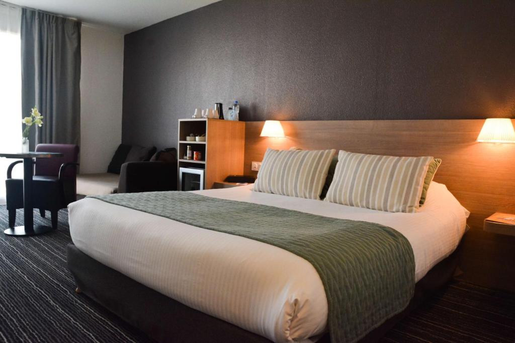 Postel nebo postele na pokoji v ubytování Best Western Plus La Marina