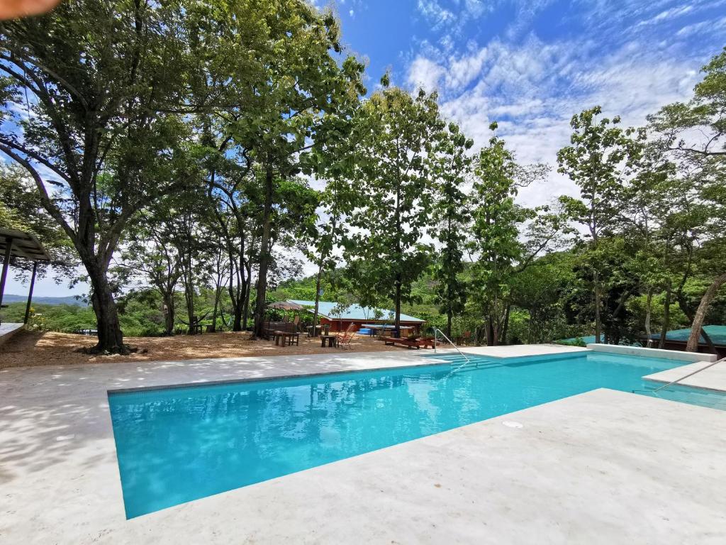 an image of a swimming pool at a house at Pinilla Highlands Incredible Mountain Ocean views in Tamarindo