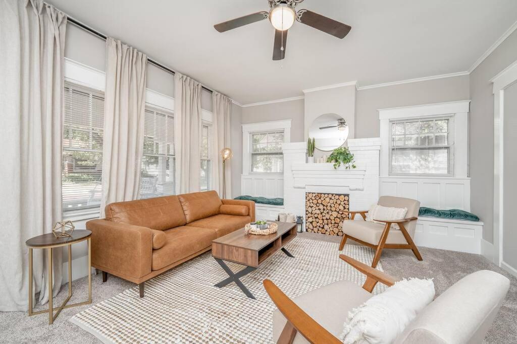 a living room with a couch and a table at 4 Bed 2 Bath Home by College Hill and Hospitals in Wichita