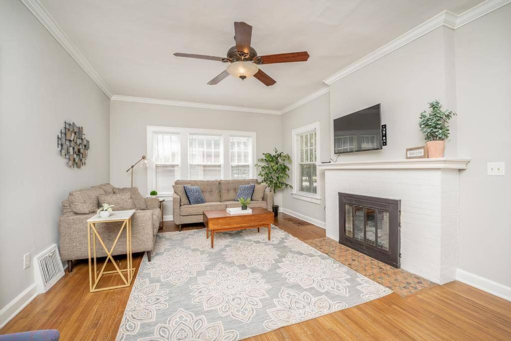 a living room with a couch and a fireplace at 3 Bed 1 5 Bath Home By College Hill & Hospitals in Wichita