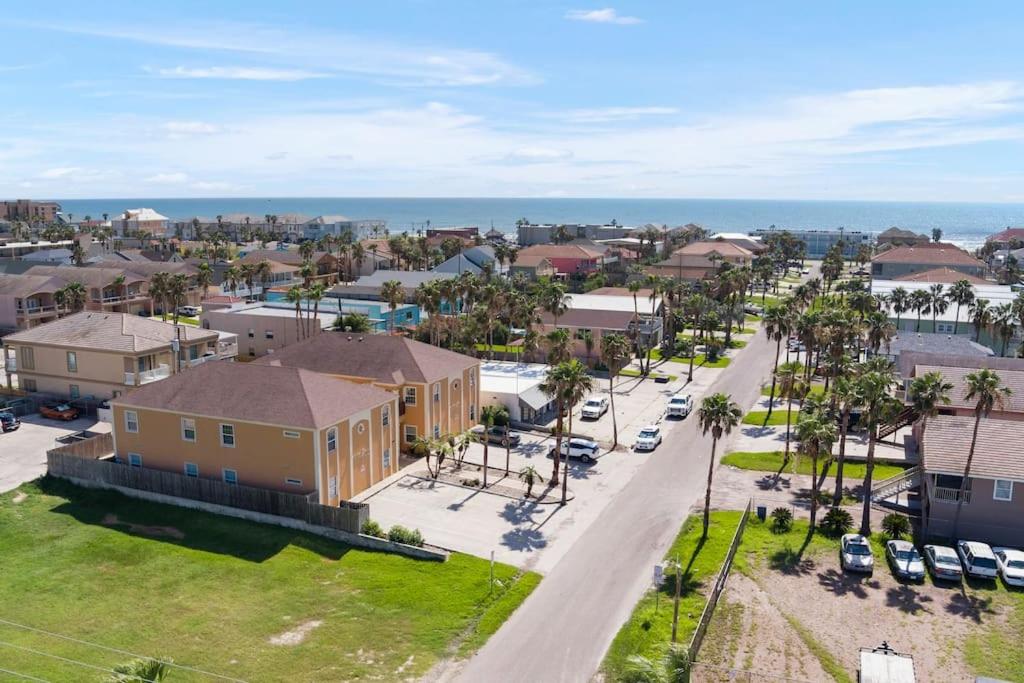 an aerial view of a residential neighborhood with cars parked at Luxury 3 Bed 2 Bath 1st Floor Condo Near Beach in South Padre Island