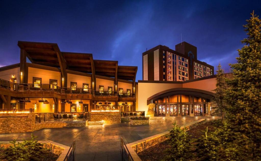 an exterior view of a building at night at Golden Nugget Lake Tahoe in Stateline