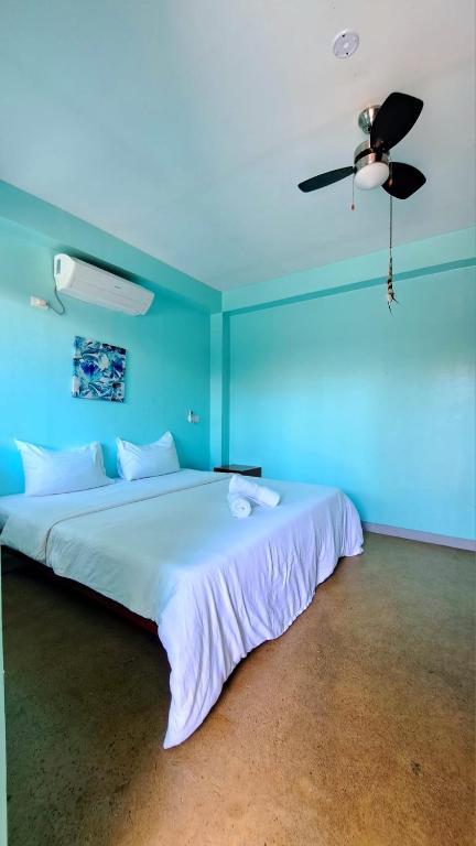 Letto o letti in una camera di In Dai Aquasports and Beach Resort