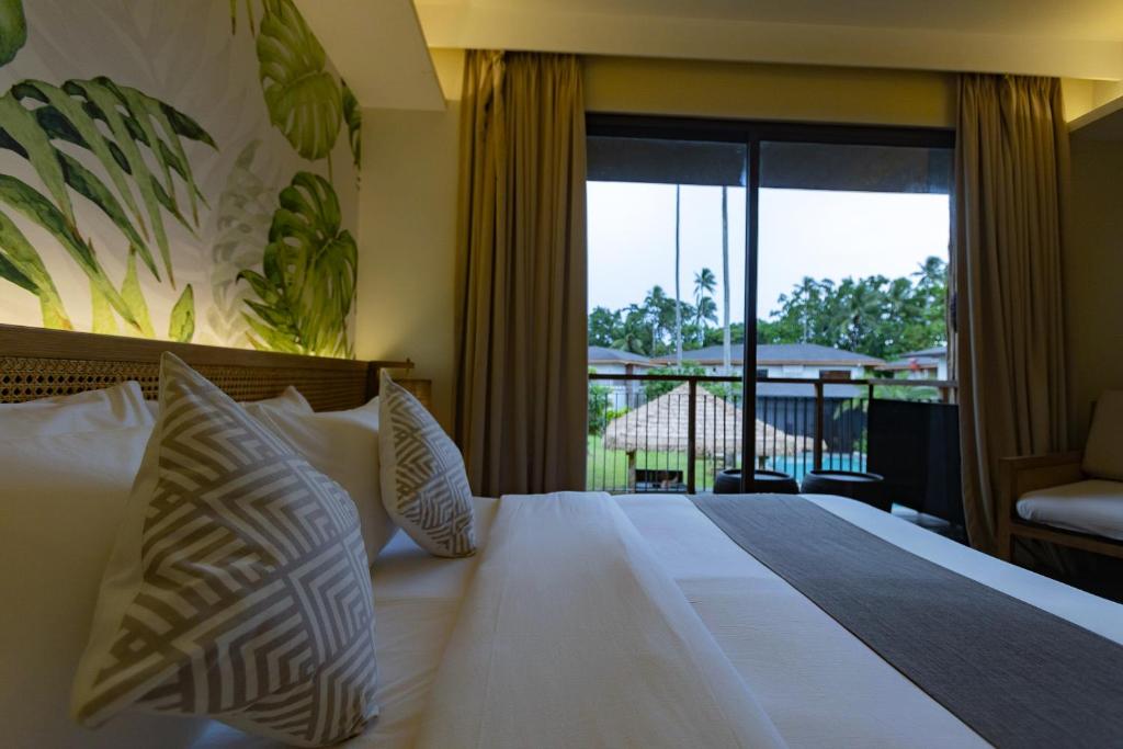 Uma cama ou camas num quarto em Isla Amara Resort