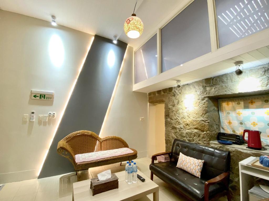 Area soggiorno di 寵物友善九份沐石原宿一館mu shi b&b