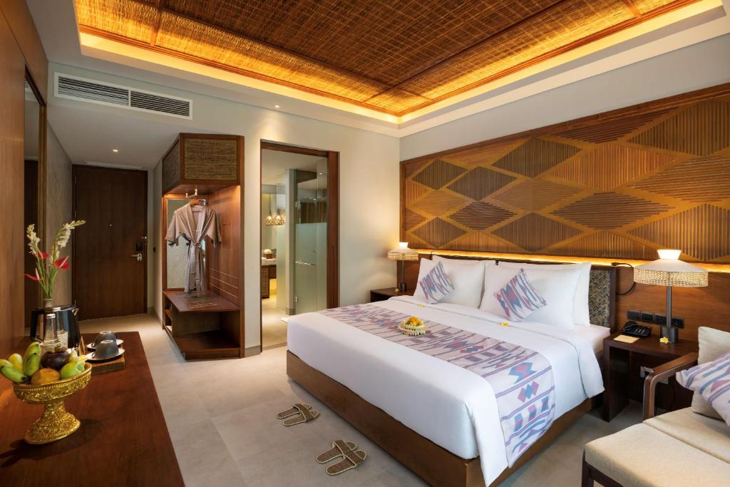 Postel nebo postele na pokoji v ubytování The Hava Ubud A Pramana Experience