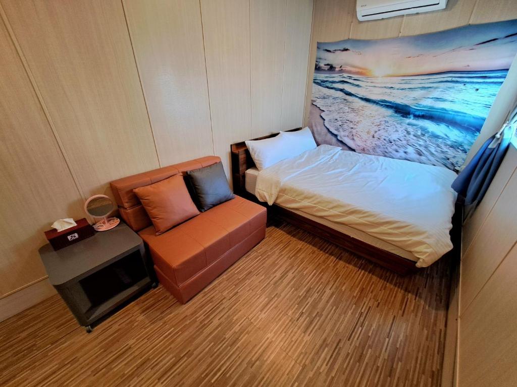 舞浪海景旅店房間的床