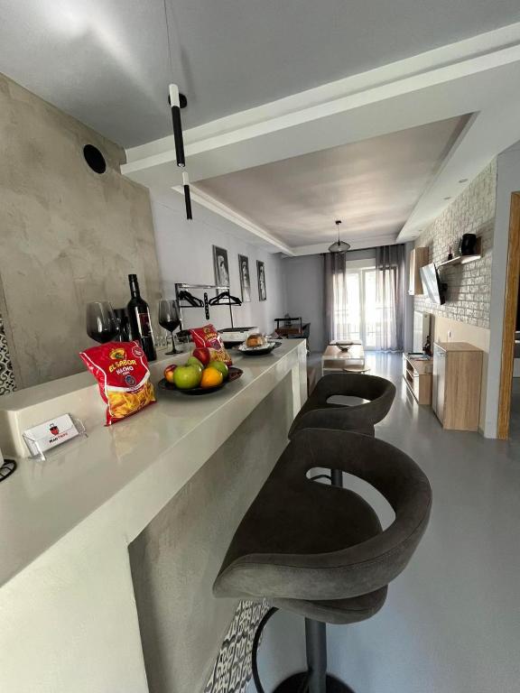 Kuchyň nebo kuchyňský kout v ubytování VIP Apt. Pezodromos Kalamarias