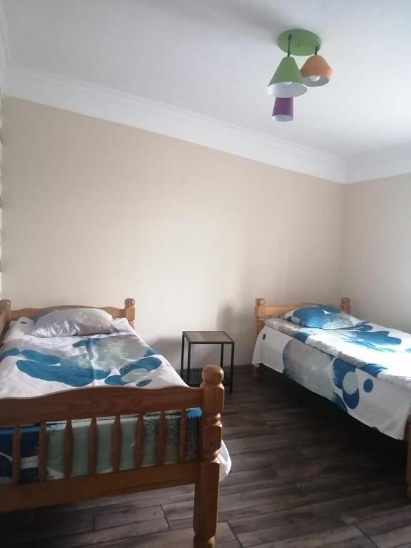 Postel nebo postele na pokoji v ubytování Ideally located spacious 3 bedroom house