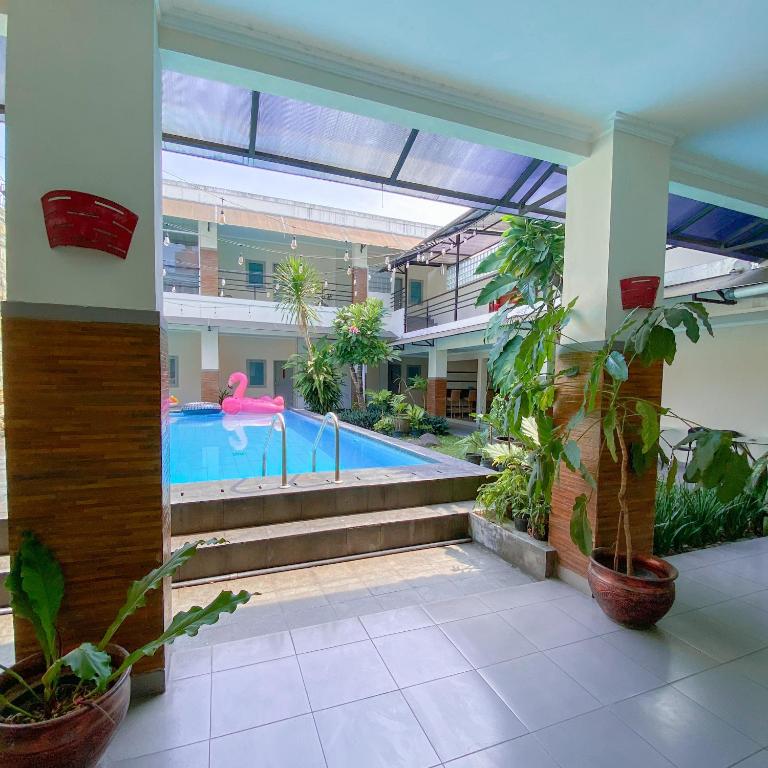Bazén v ubytování DINASTY STYLE HOTEL SOLO nebo v jeho okolí