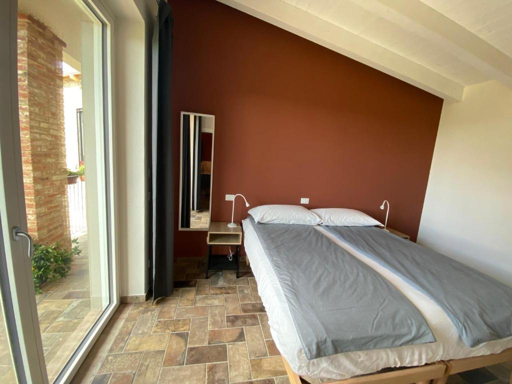 Ένα ή περισσότερα κρεβάτια σε δωμάτιο στο Fuoridicampo