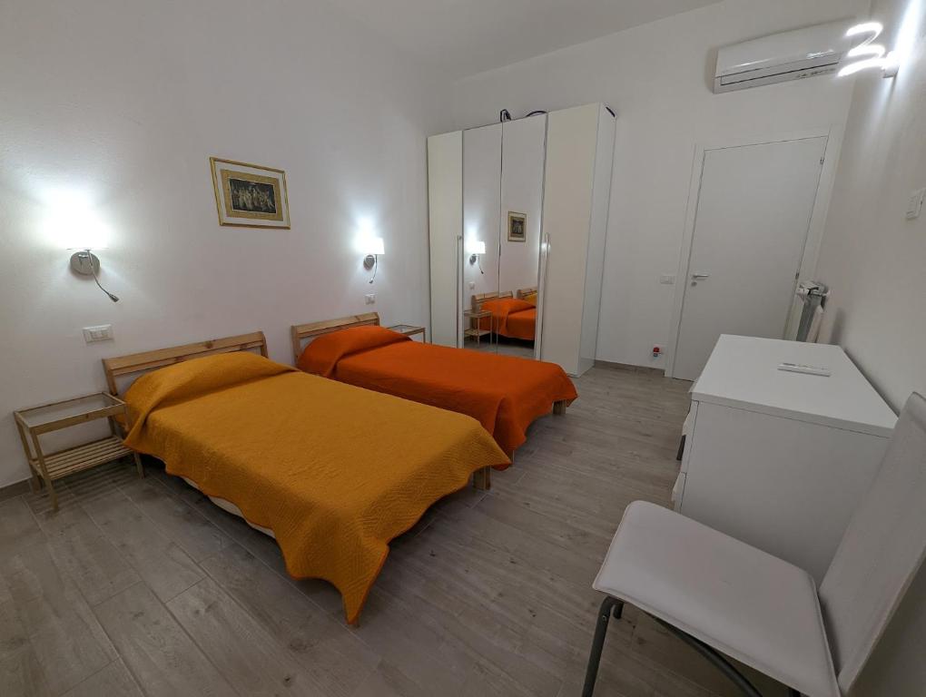 Postel nebo postele na pokoji v ubytování Il Centro