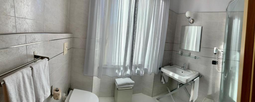 Koupelna v ubytování Hotel Bella 'Mbriana