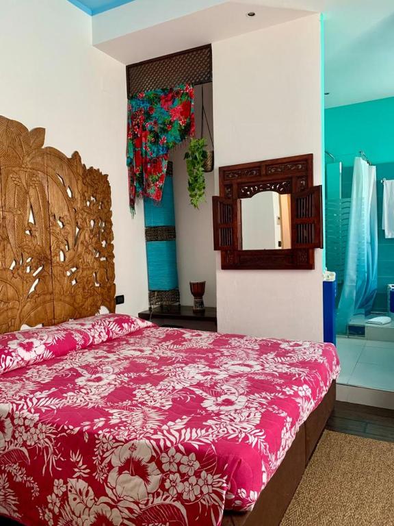 Postel nebo postele na pokoji v ubytování Hotel Bella 'Mbriana