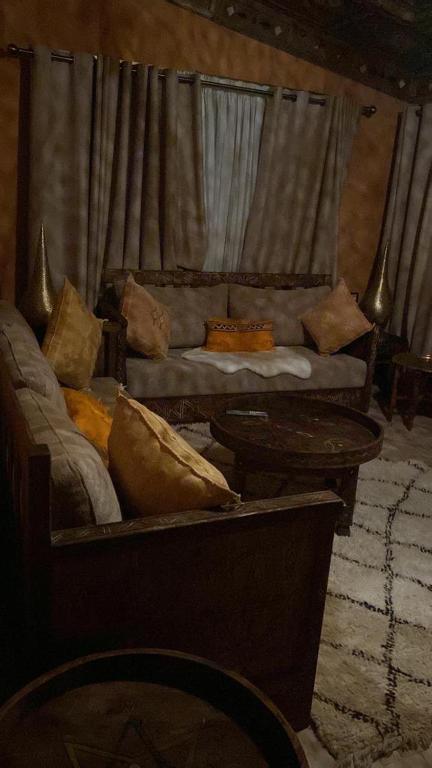 Posezení v ubytování Chalets-Appartements Tourtite