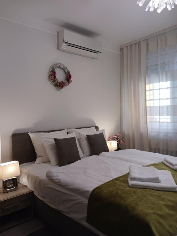 Posteľ alebo postele v izbe v ubytovaní Corner Apartment