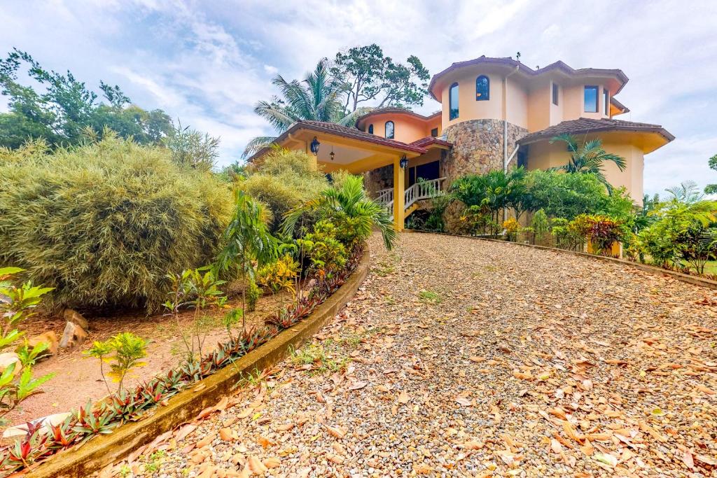 a house with a gravel driveway in front of it at Morningstar Breeze Gold Standard Certified in Hopkins