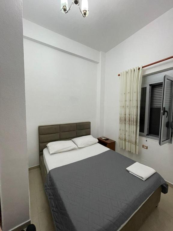 Postel nebo postele na pokoji v ubytování Guest House Kocollari