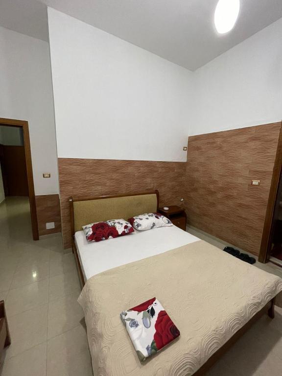 Postel nebo postele na pokoji v ubytování Guest House Kocollari