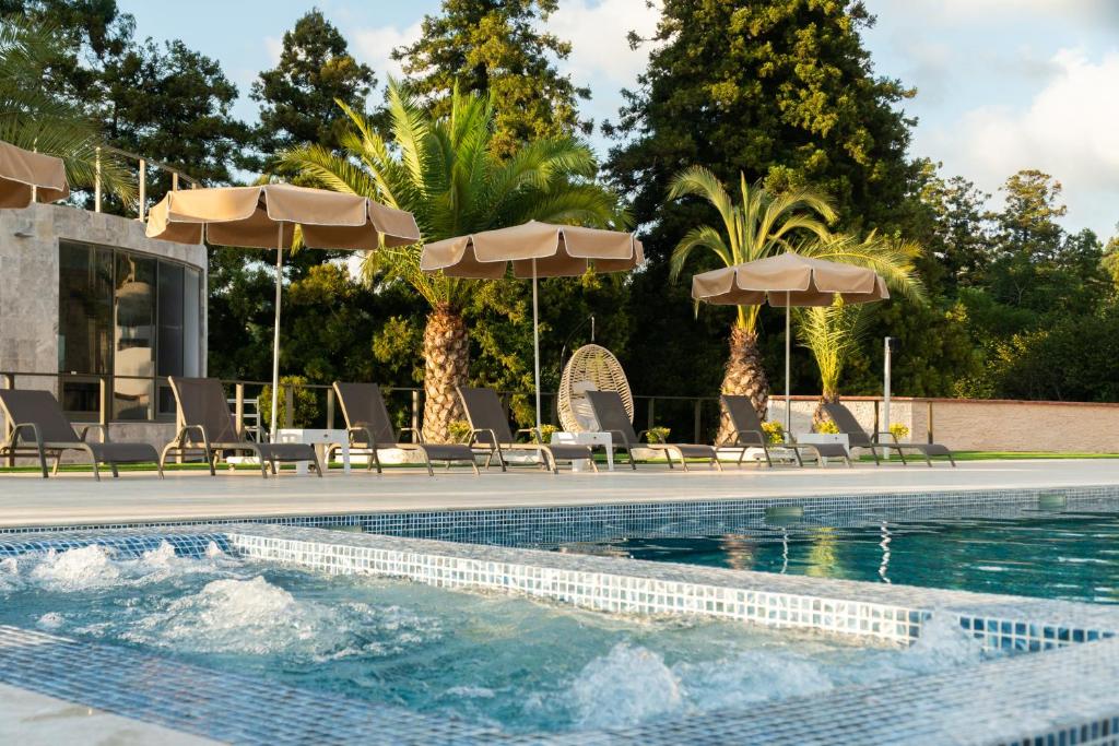 Bazén v ubytování Villa Elysium Park & SPA nebo v jeho okolí