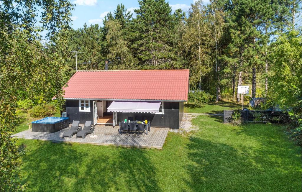 an overhead view of a small house with a red roof at Stunning Home In Rdby With Wifi in Rødby