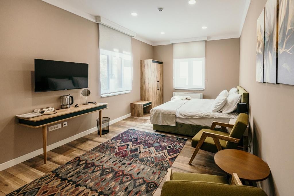 TV a/nebo společenská místnost v ubytování Pansion "Fawlty Towers" Sarajevo