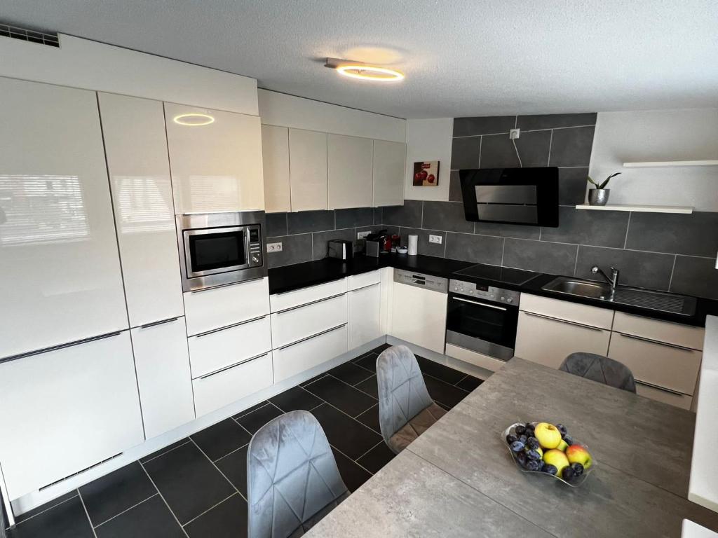 Kuchyň nebo kuchyňský kout v ubytování Ferienwohnung Bad Säckingen