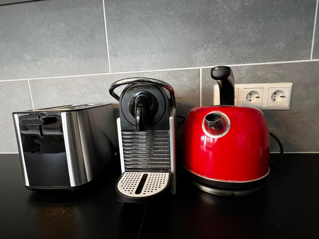 Příslušenství pro přípravu čaje a kávy v ubytování Ferienwohnung Bad Säckingen