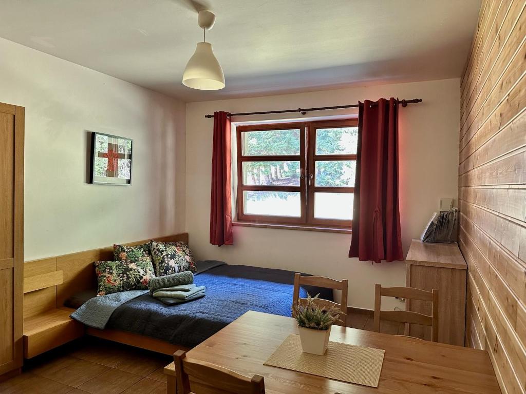Posezení v ubytování Cihlářka - Vysokohorský apartmán 208