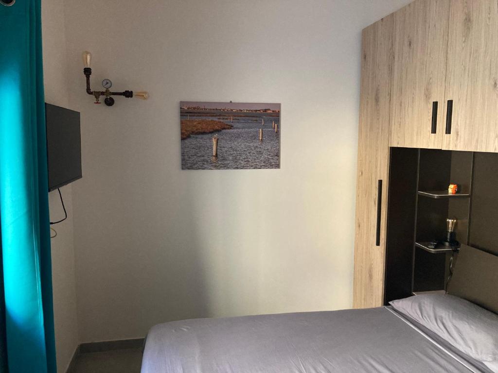 Postel nebo postele na pokoji v ubytování AL RUDERINO