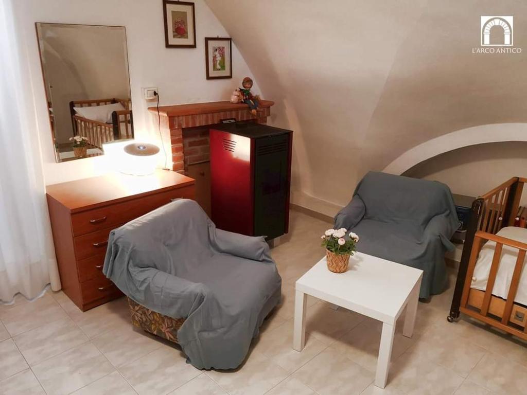 Postel nebo postele na pokoji v ubytování Arco Antico