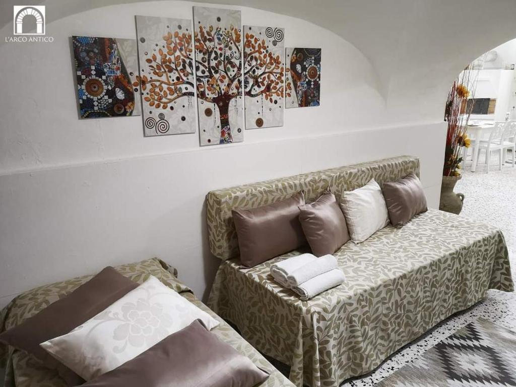 Postel nebo postele na pokoji v ubytování Arco Antico