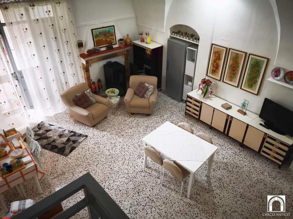 TV a/nebo společenská místnost v ubytování Arco Antico