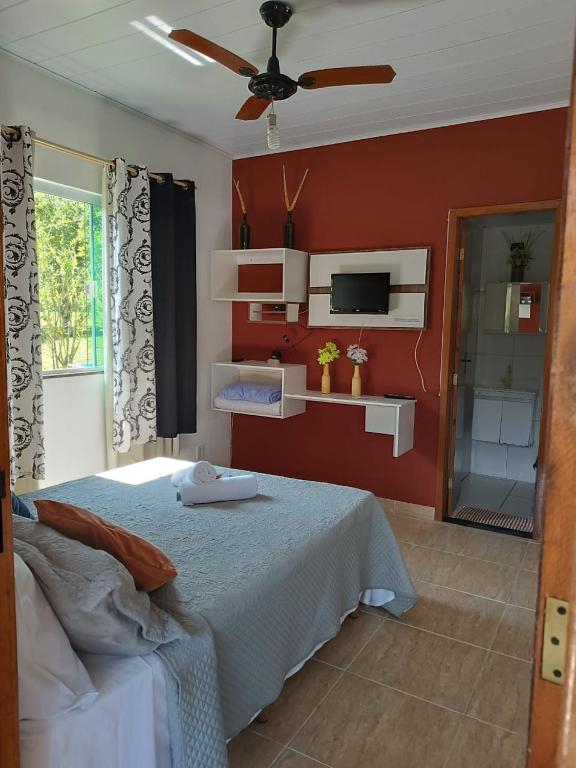 Postel nebo postele na pokoji v ubytování Pousada Sítio da Floresta