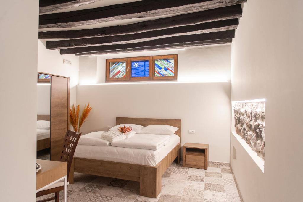 Postel nebo postele na pokoji v ubytování LA CURT guest house