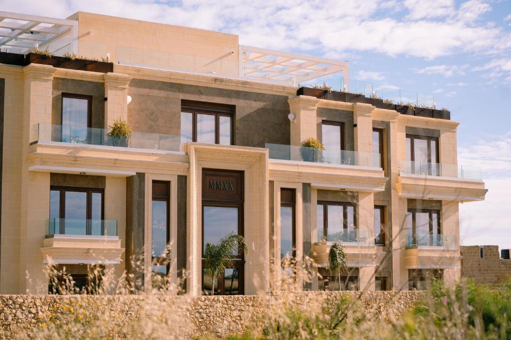 a rendering of a house with windows at Santa Lucia Boutique Hotel in Santa Luċija