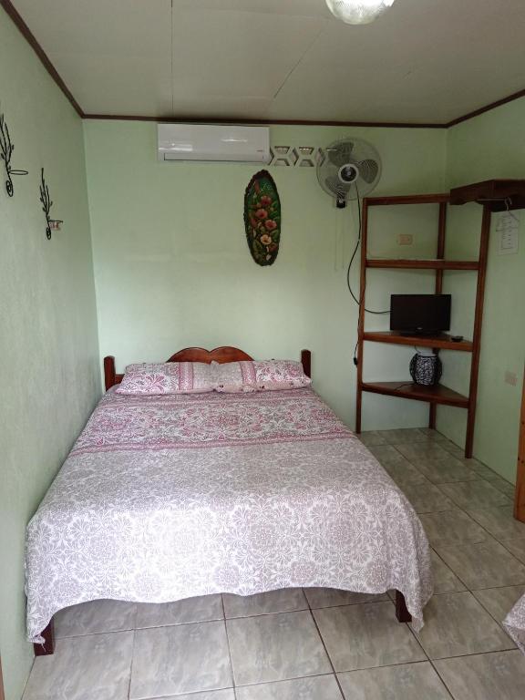 Postel nebo postele na pokoji v ubytování Posada Rural Río Celeste